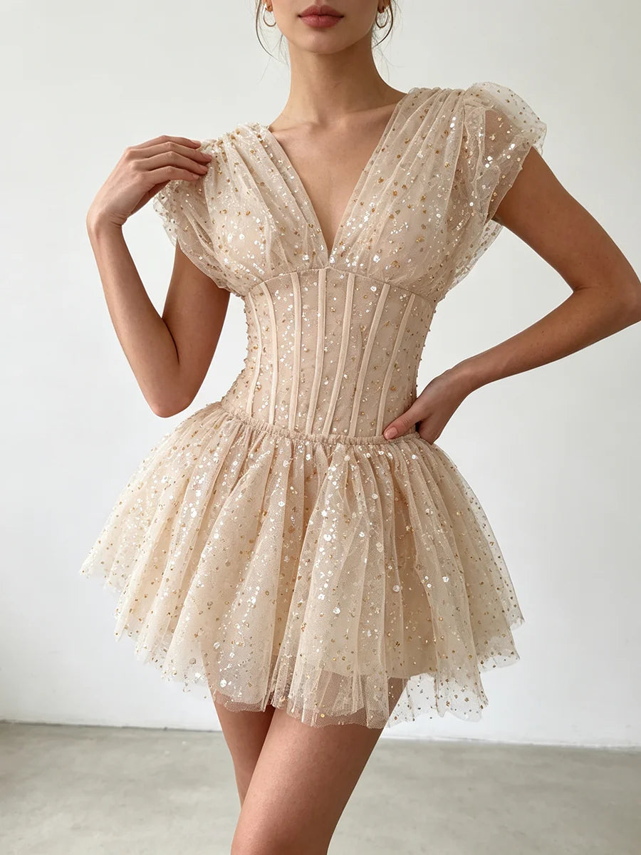 The Lumière Sequin Ruffle Mini Dress from the Celebration Edit at Lavishly Me