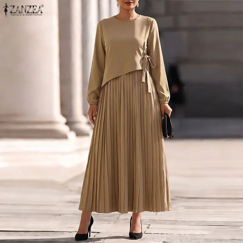 The Elara Pleated A-Line Maxi Dress from the Boss Energy at Lavishly Me