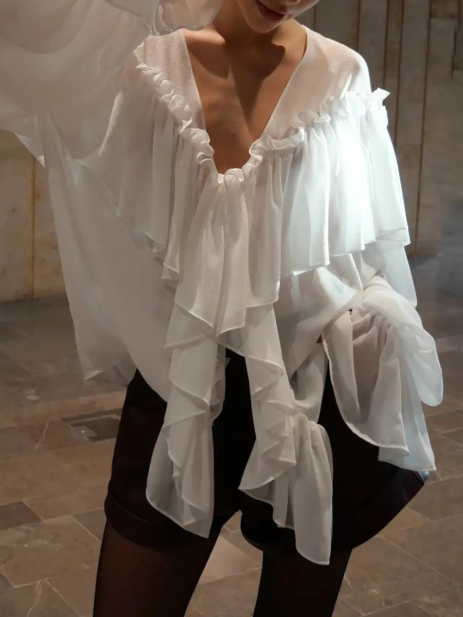 The Delphine Sheer Ruffle Blouse from the After Dark at Lavishly Me