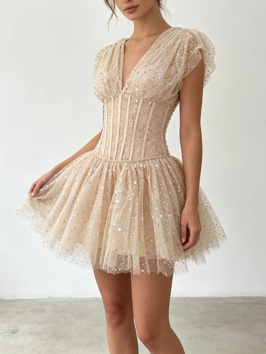 The Lumière Sequin Ruffle Mini Dress from the Celebration Edit at Lavishly Me
