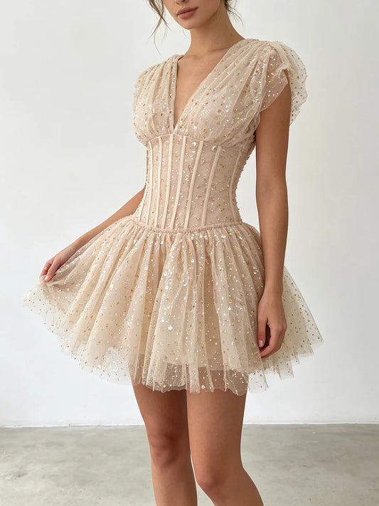 The Lumière Sequin Ruffle Mini Dress from the Celebration Edit at Lavishly Me
