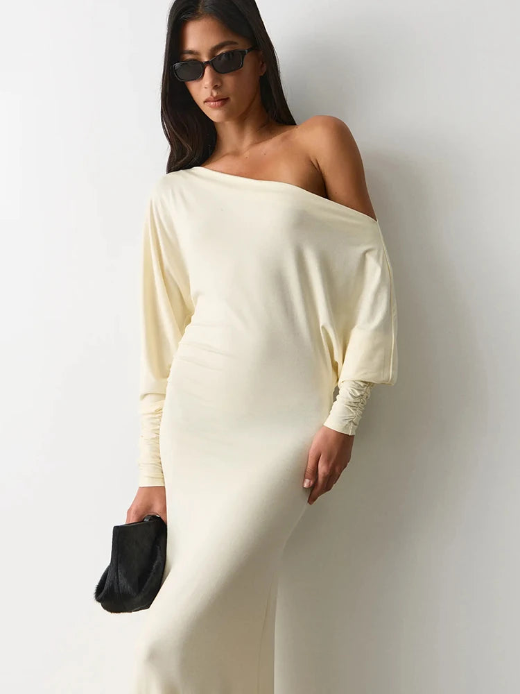 The Celestia Off-Shoulder Ruched Maxi Dress from the Celebration Edit at Lavishly Me