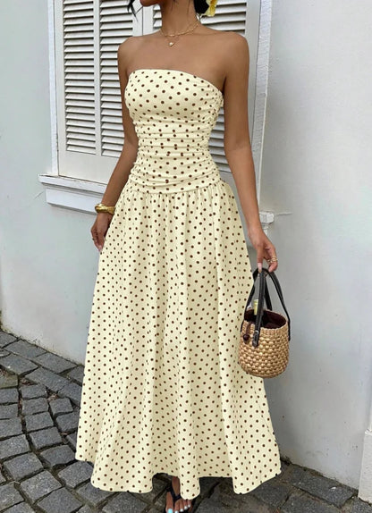 The Nadine Polka-Dot Ruffle Maxi Dress in black | Lavishly Me