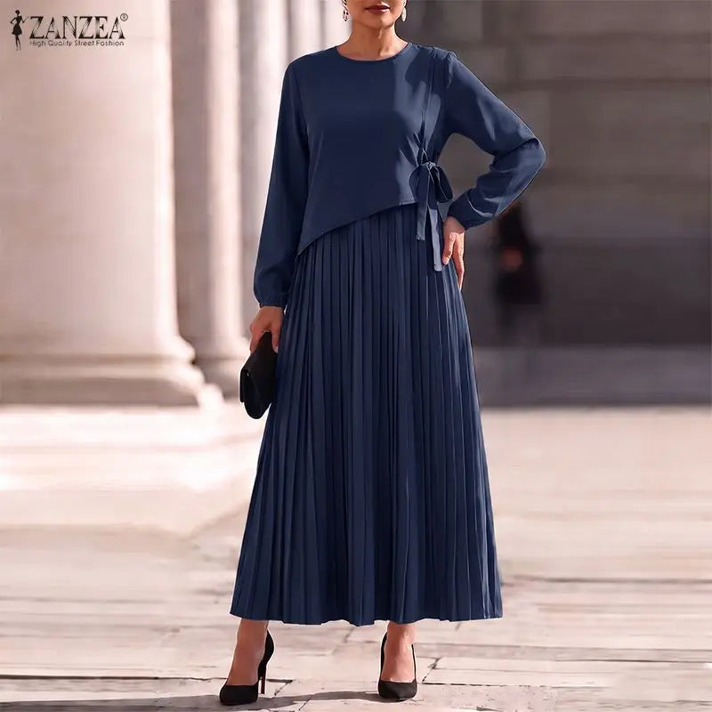 The Elara Pleated A-Line Maxi Dress from the Boss Energy at Lavishly Me