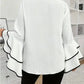 The Romina Statement Blouse