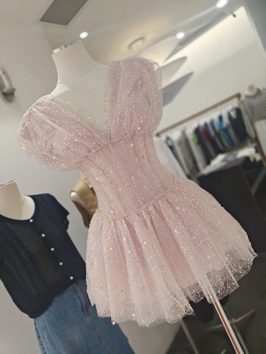 The Lumière Sequin Ruffle Mini Dress from the Celebration Edit at Lavishly Me