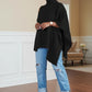 The Tatiana Asymmetric Hollow Out Statement Sweater