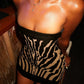 The Zuri Zebra Strapless Mini Dress in black | Lavishly Me