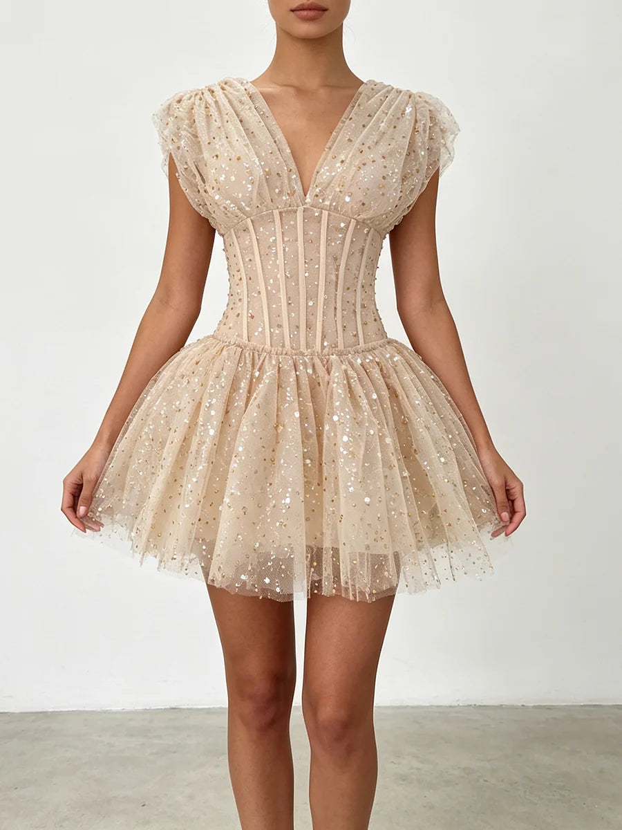The Lumière Sequin Ruffle Mini Dress from the Celebration Edit at Lavishly Me