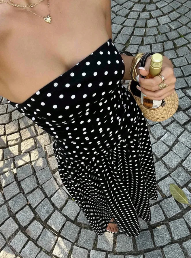 The Nadine Polka-Dot Ruffle Maxi Dress in black | Lavishly Me