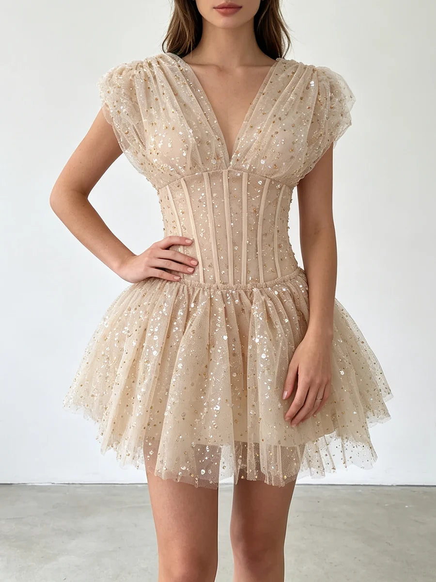 The Lumière Sequin Ruffle Mini Dress from the Celebration Edit at Lavishly Me