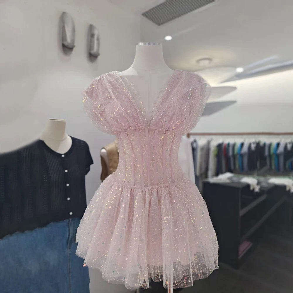 The Lumière Sequin Ruffle Mini Dress from the Celebration Edit at Lavishly Me