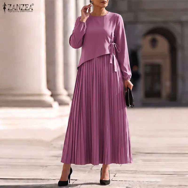 The Elara Pleated A-Line Maxi Dress from the Boss Energy at Lavishly Me
