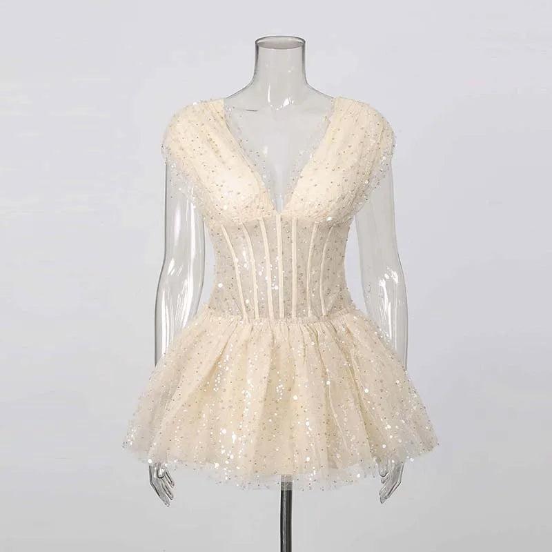 The Lumière Sequin Ruffle Mini Dress from the Celebration Edit at Lavishly Me