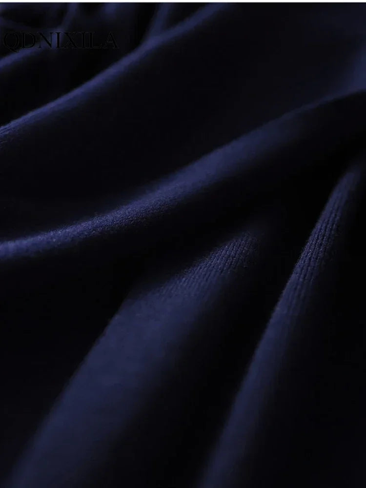 The Celine Wrap Knit Dress in Navy blue | Lavishly Me