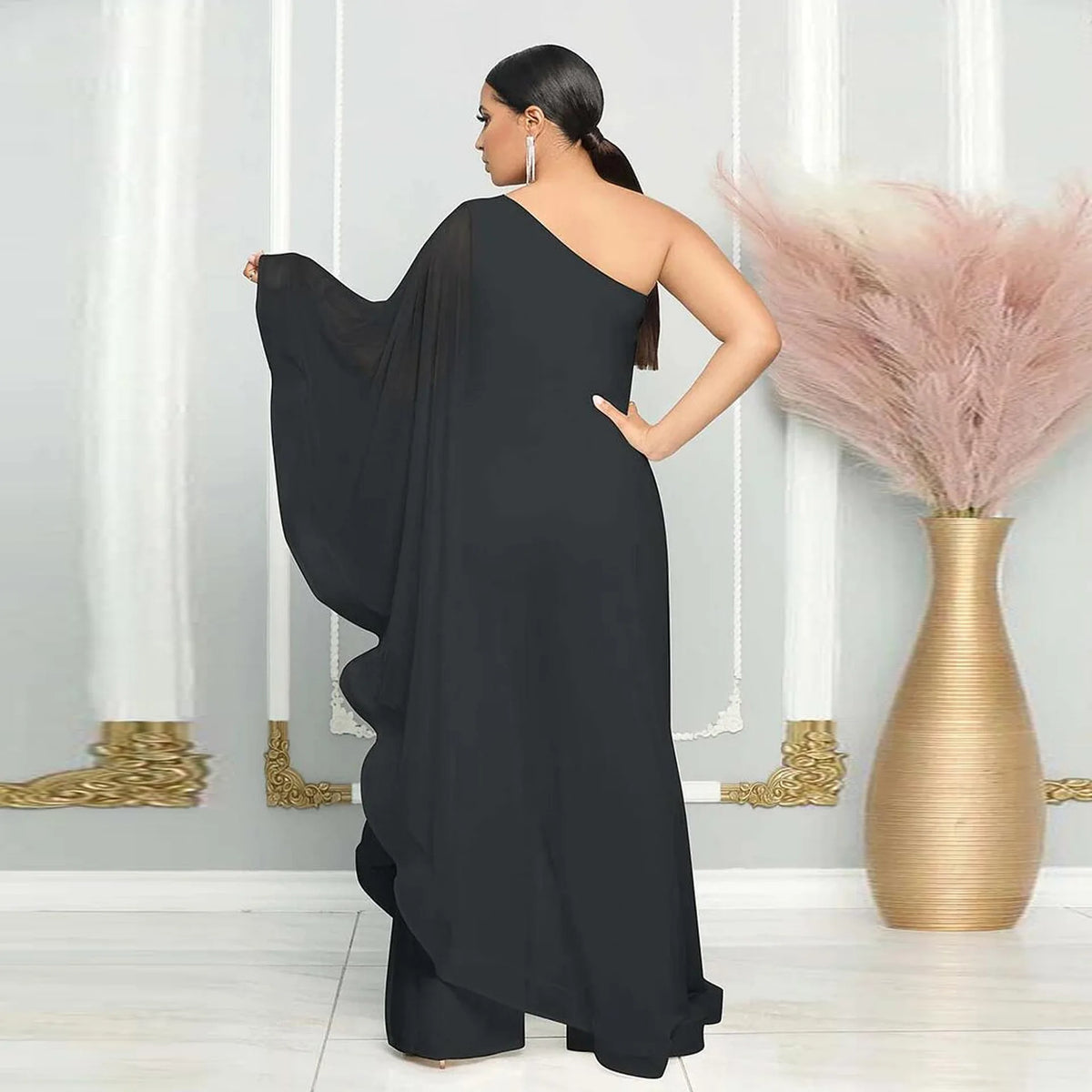 The Cassia One-Shoulder Ruffle Jumpsuit in Pink | Lavishly Me