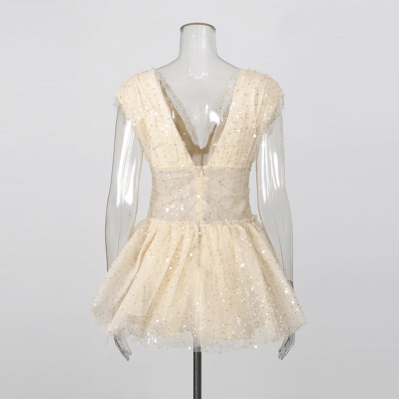 The Lumière Sequin Ruffle Mini Dress from the Celebration Edit at Lavishly Me