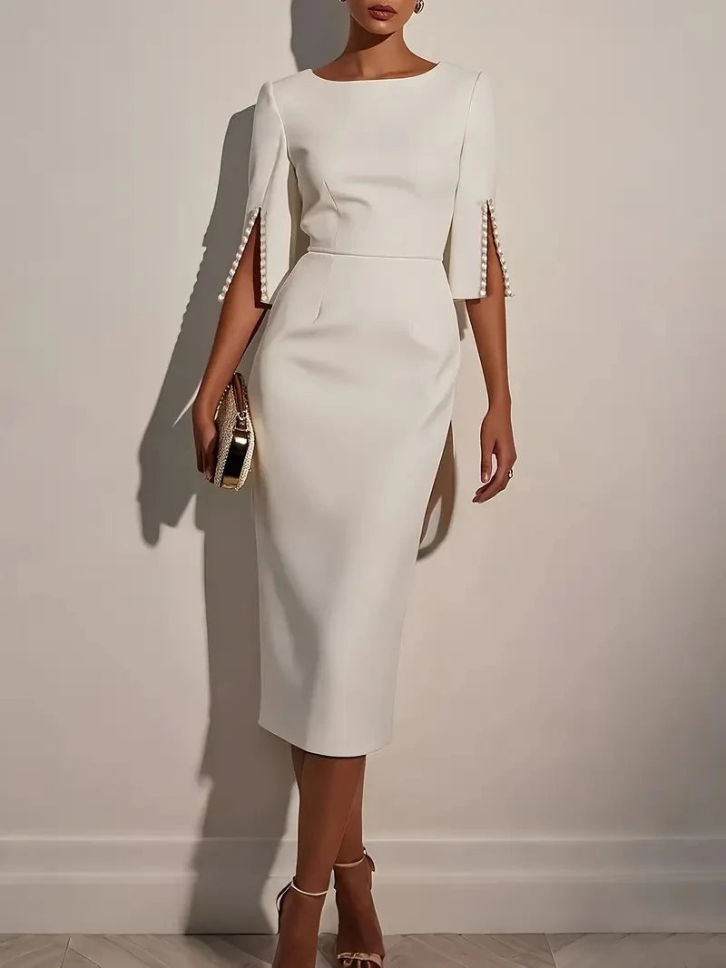 The Lucienne Pearl-Embellished Midi Dress in Pink | Lavishly Me