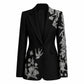 Lavishly Me black longline blazer featuring intricate silver floral and bird beadwork on the lapel and sleeve.