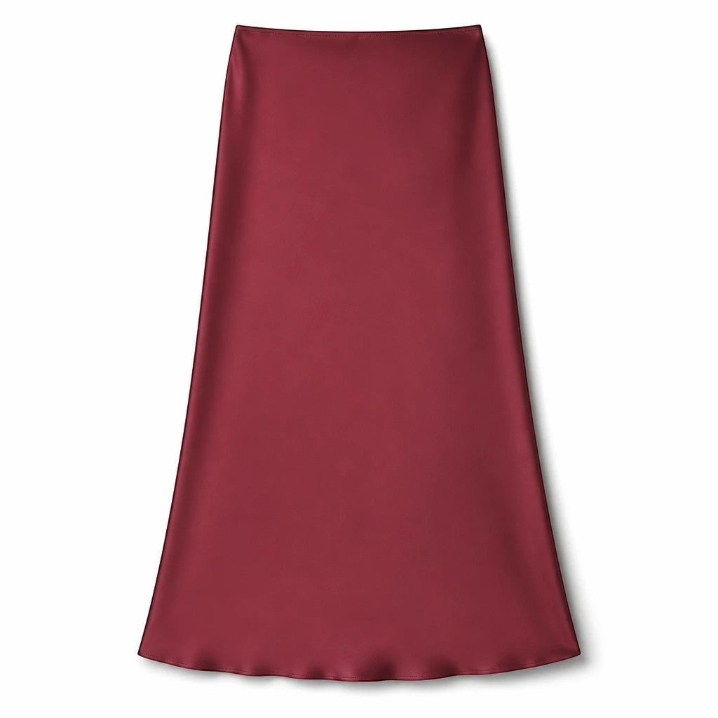 Lavishly Me Riviera satin maxi skirt in a deep burgundy red with a fluid, minimalist silhouette.